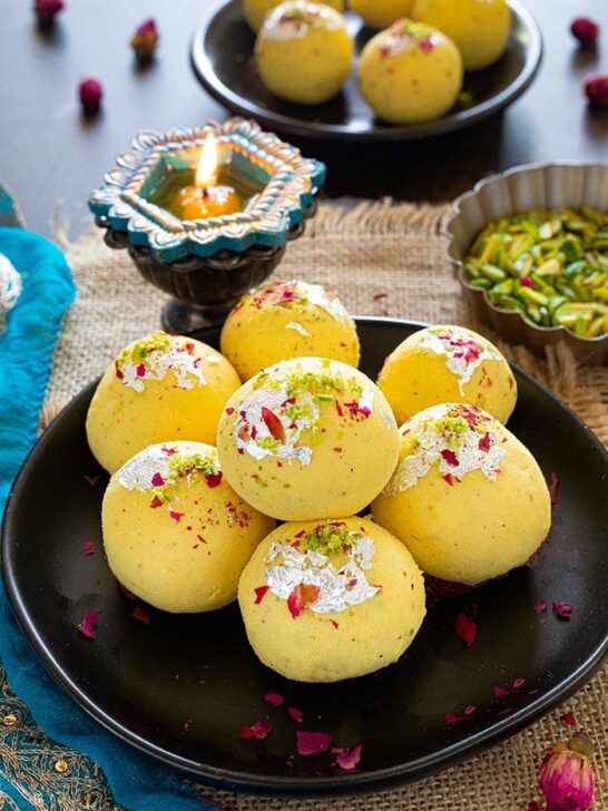 Rasmalai Ladoo on a black plate