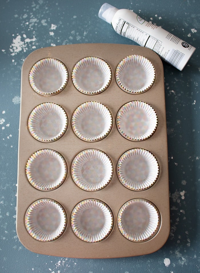 Line the cupcake tray with liner