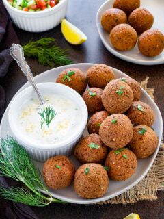 Falafels in a tray with sauce