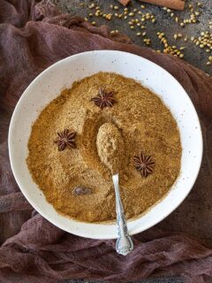 Garam Masala Powder in a plate with spoon