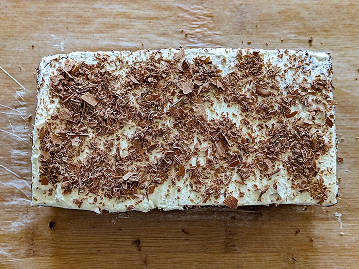 Top black forest pastry with chocolate shavings