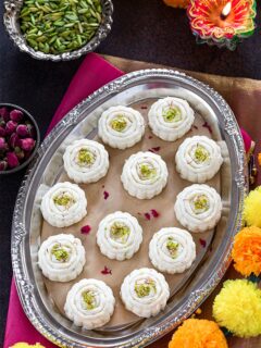 Milk Pedas on a tray garnished with pistachios