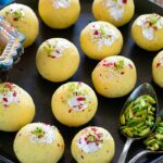 Rasmalai Ladoo on a plate with pistachios