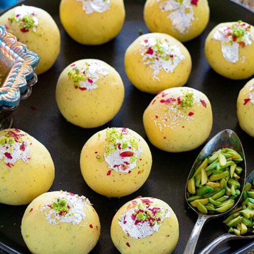 Rasmalai Ladoo on a plate with pistachios