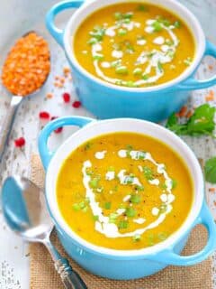 Roasted Butternut Squash and Lentil Soup in bowls garnished with scallions