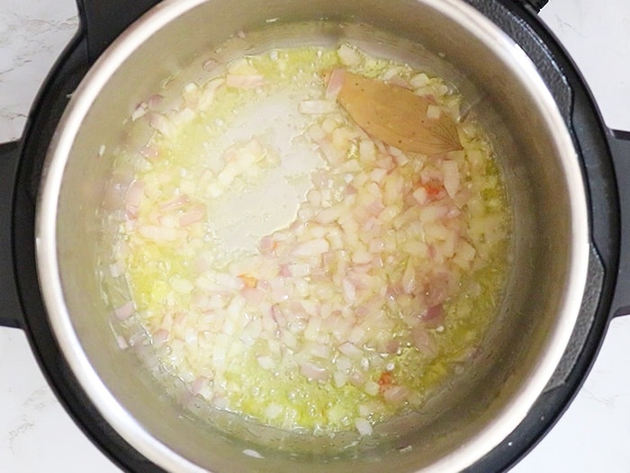 Add and cook onions