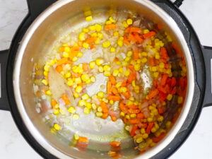 Add vegetables to Instant Pot Barley Lentil Vegetable Soup